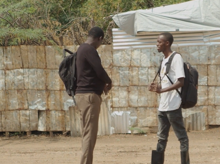 Two men in Kakuma, Kenya talking